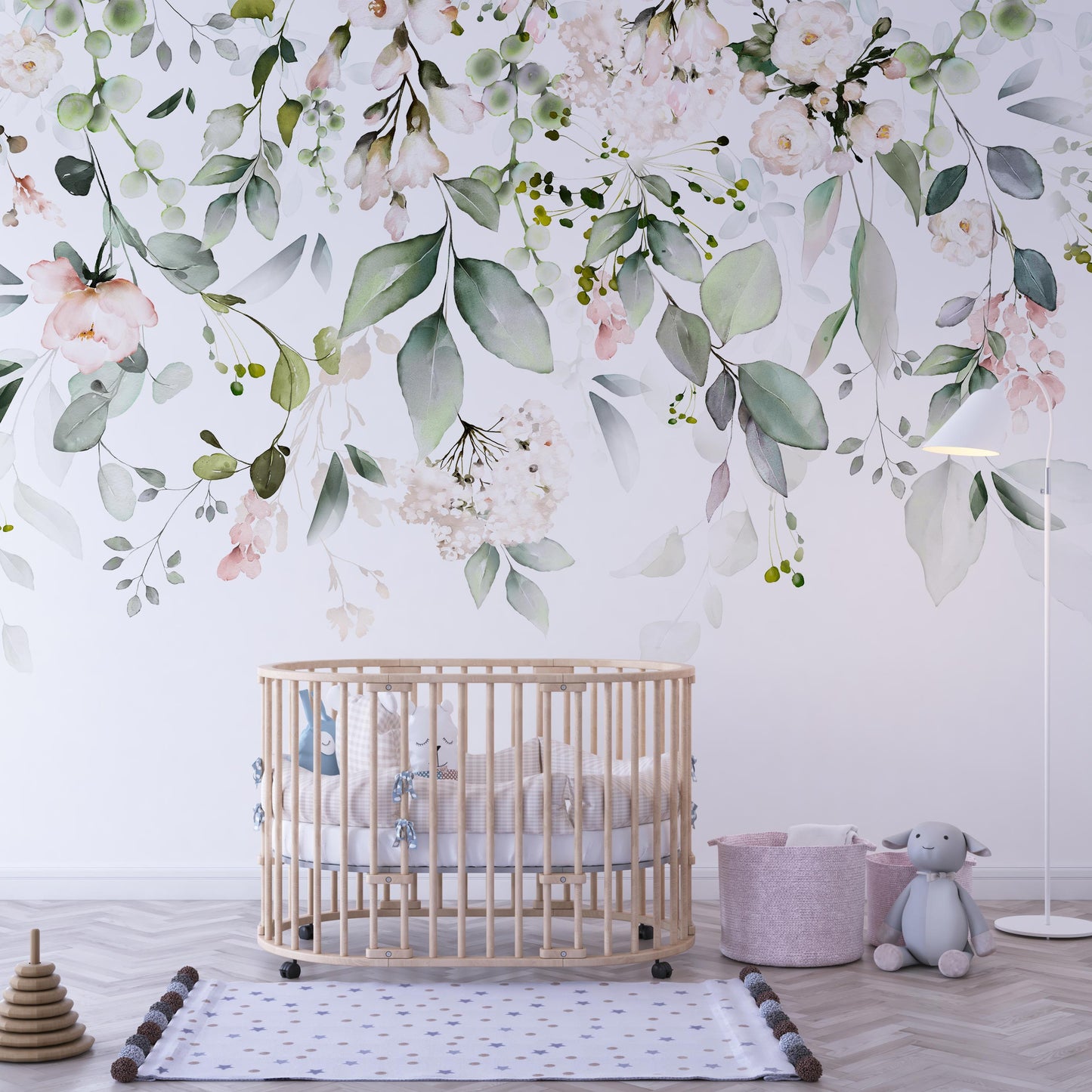 Minimalist Nursery with Round Wooden Crib:  Removable sage green botanical mural accentuates minimalist nursery with round wooden crib.