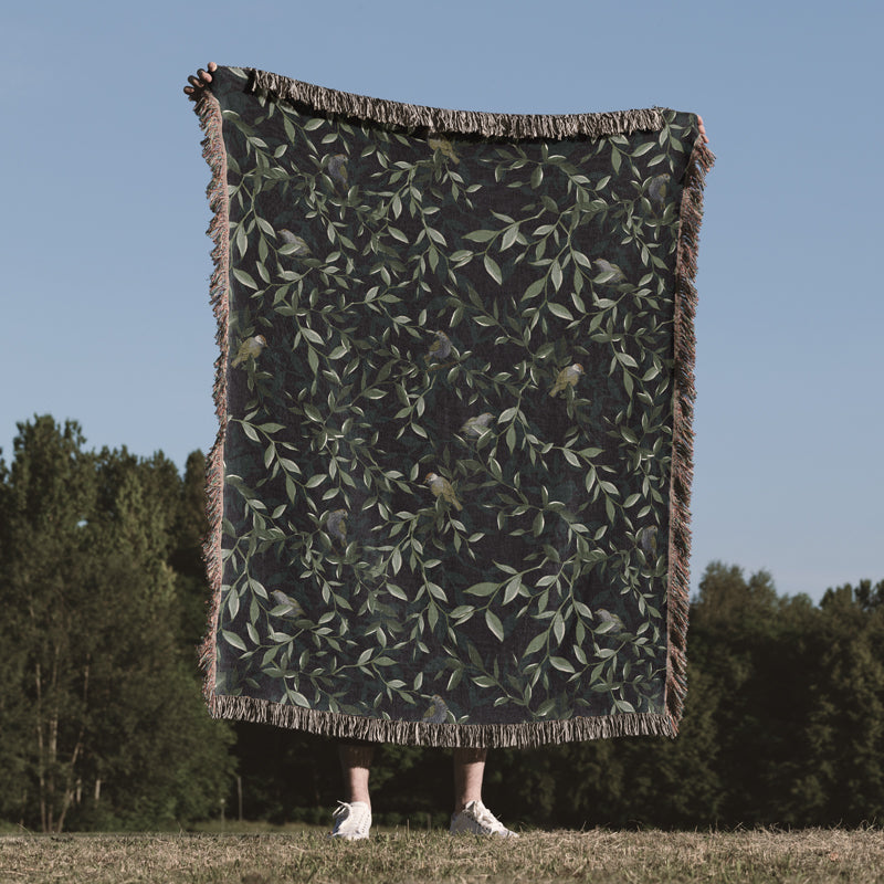 Green leafy throw blanket with botanical design