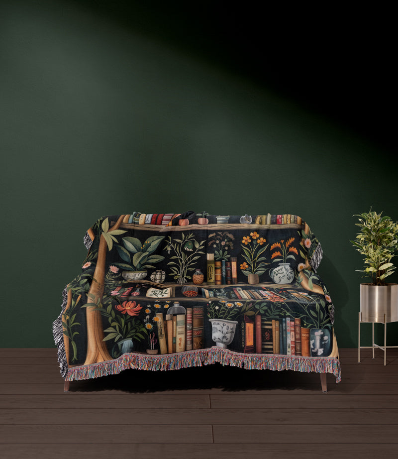 Gothic Cottagecore Throw Blanket - A styled image of the blanket draped over a vintage armchair.