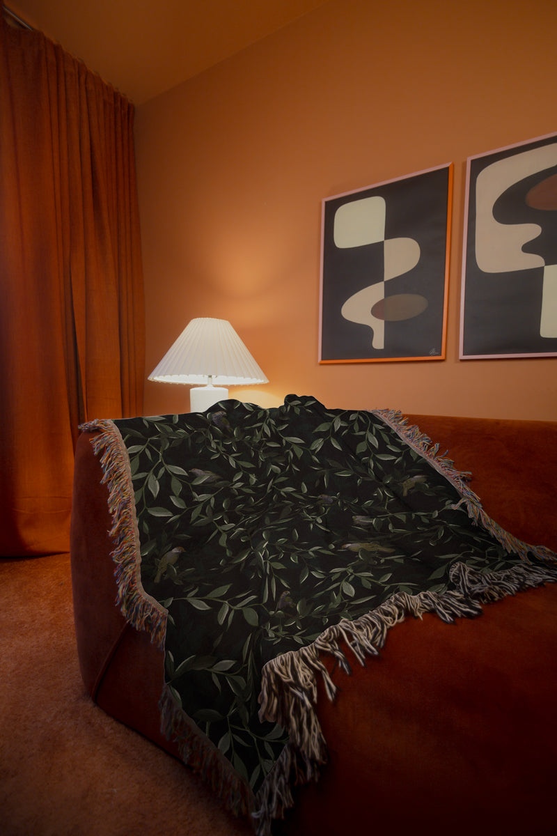 Cottagecore leafy throw blanket draped over a sofa