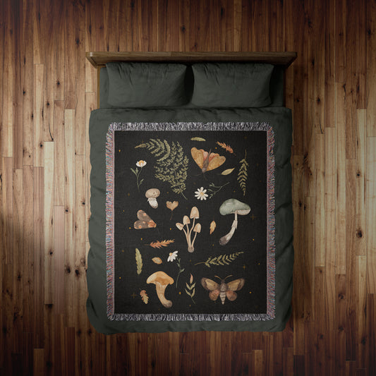 Cottagecore mushroom woven blanket with dark woodland design