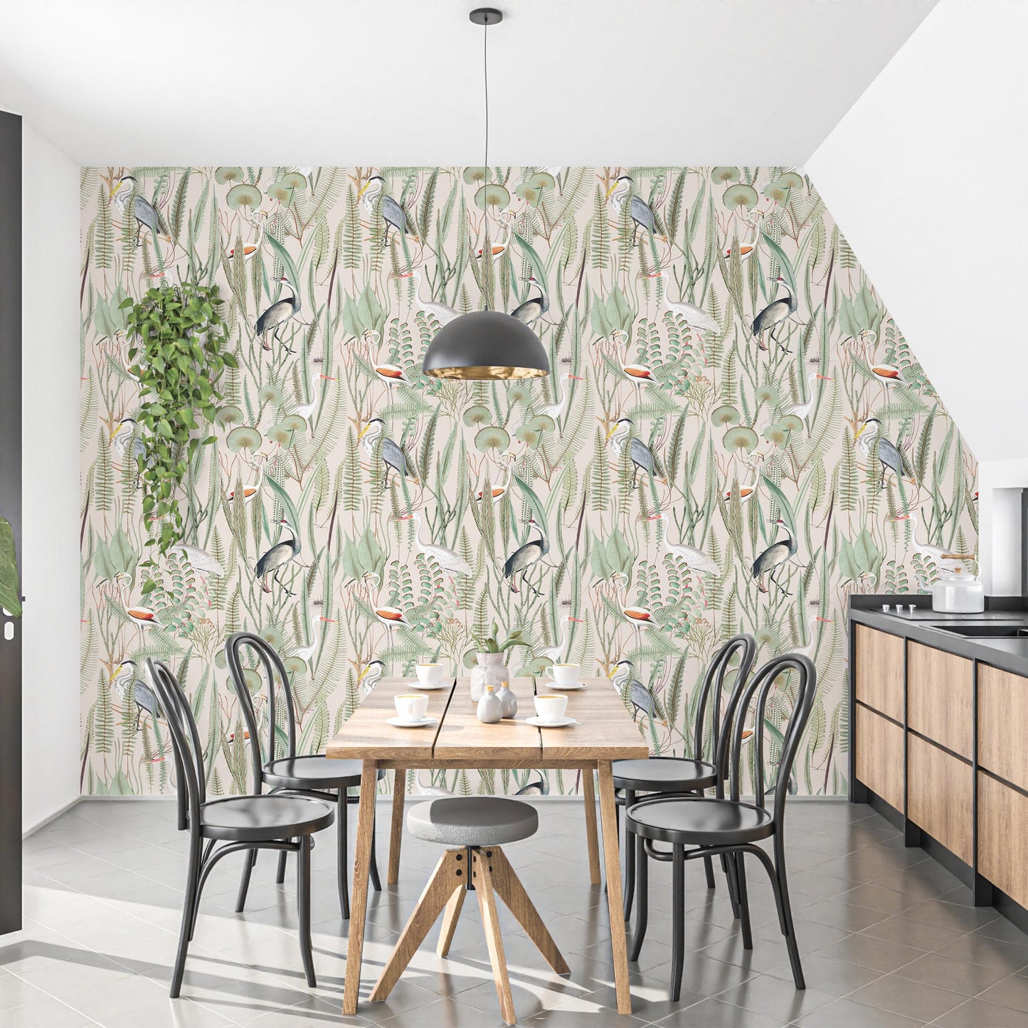 Infuse your kitchen with a touch of nature's elegance with our captivating pink botanical crane peel-and-stick accent wallpaper. This statement piece features graceful herons amidst a vibrant floral tapestry, adding a touch of sophistication to your minimalist kitchen. Pair the wallpaper with sleek wooden cabinets and black accents, creating a harmonious balance between natural beauty and modern design.