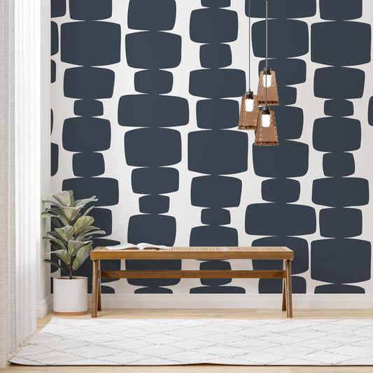 Mid-Century Modern Hallway: Navy Geometric Wallpaper with Wooden Bench, Woven Light Fixtures, and Cream Accents