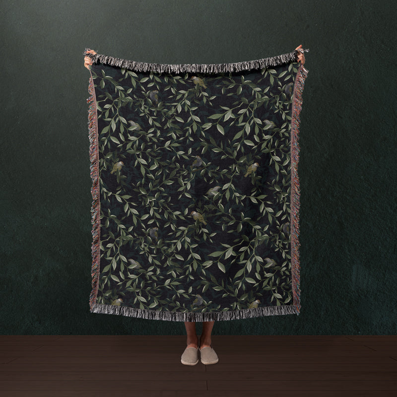 Green leafy throw blanket with botanical design