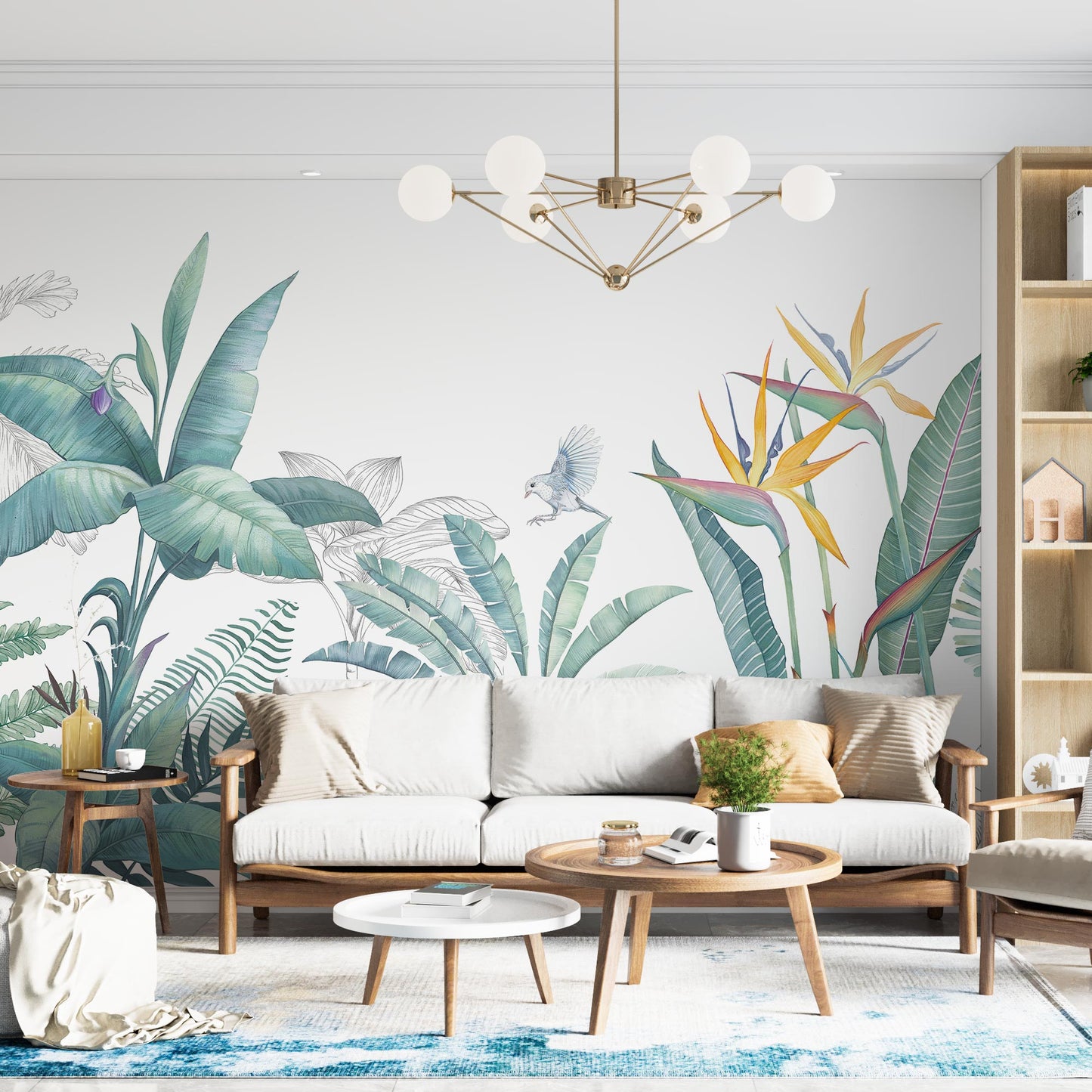 Spacious and inviting living room with white couch, wooden furniture, and a statemnt wall with botanical wallpaper mural
